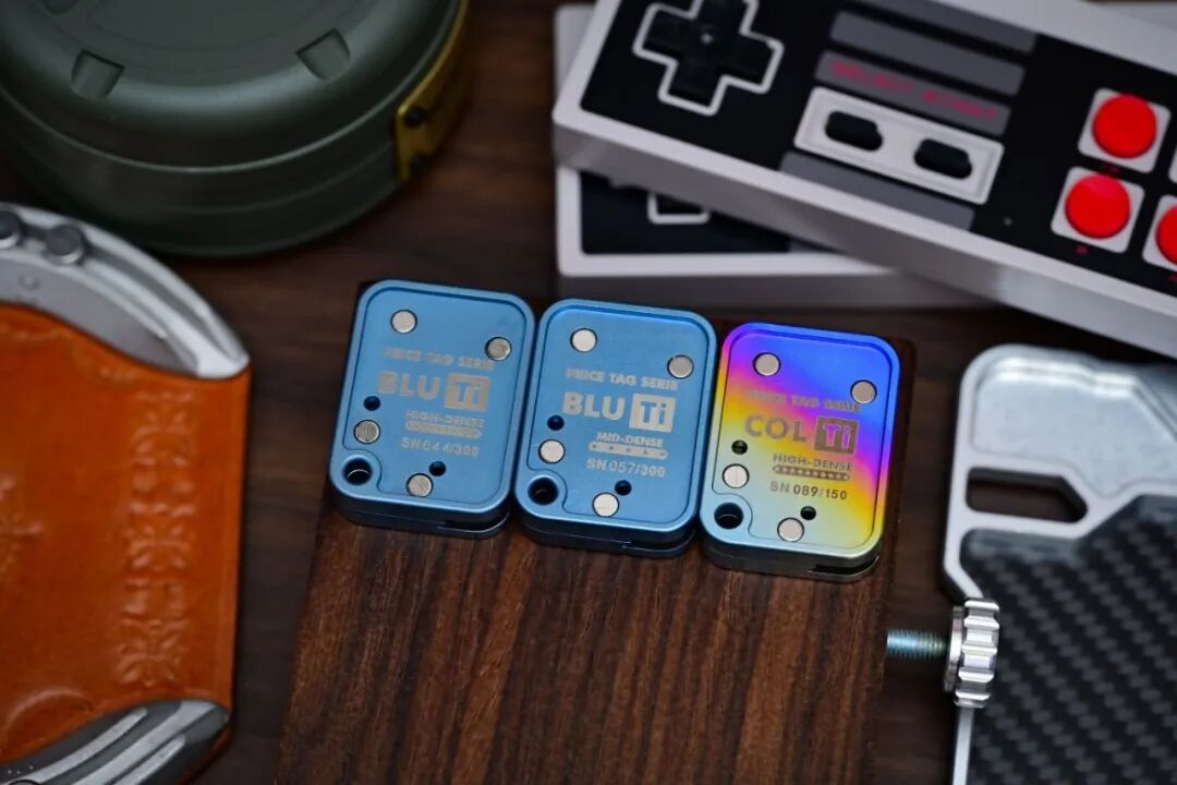 Two blue Price Tag backs beside a multicolor version