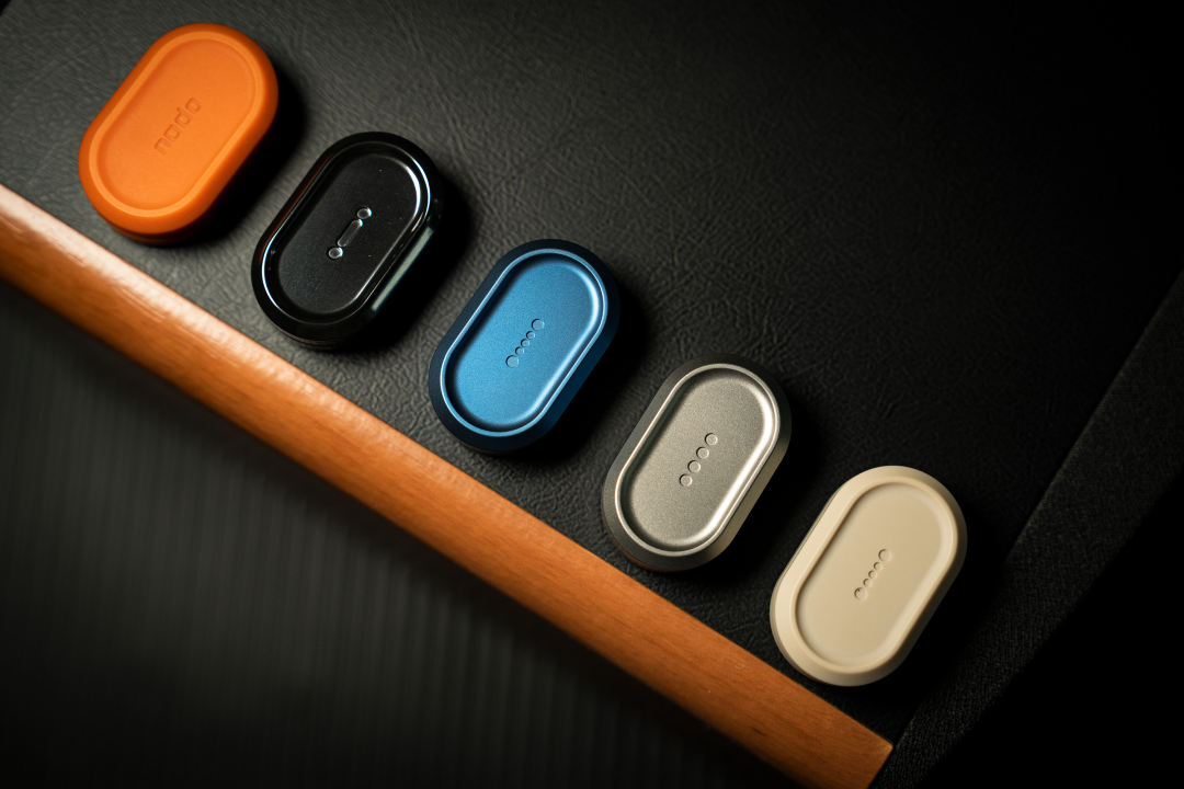 Five nado sliders with different colours and finishes arranged in a row