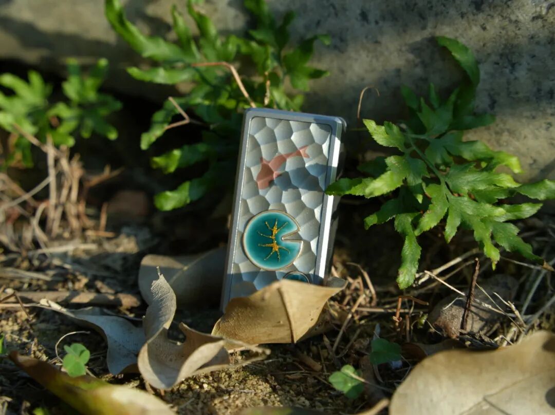 Hejian Liying slider outdoors, with koi and lotus leaves set into a silver-coloured textured ground