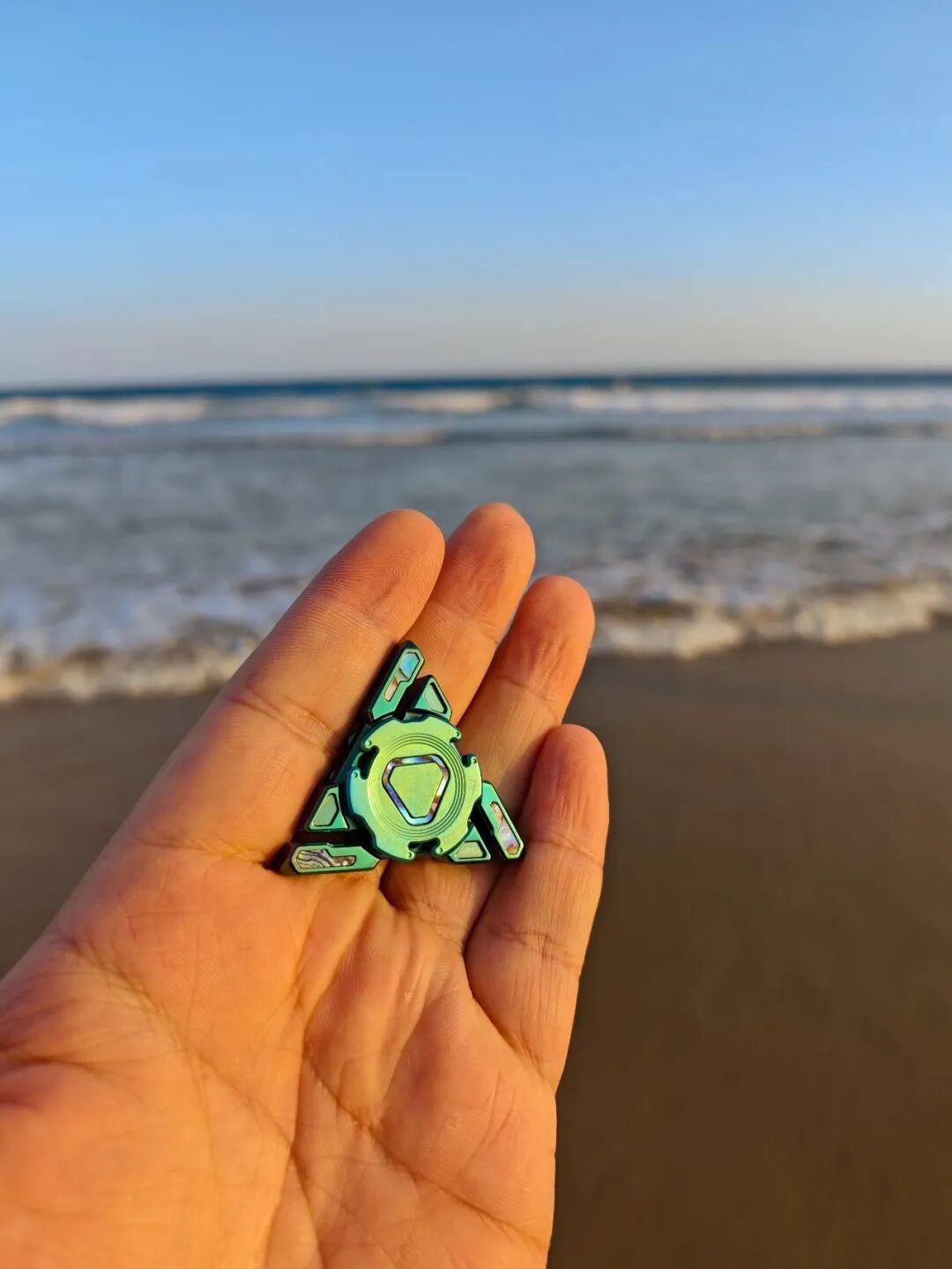 Green-coloured Santi Mini with localised shell inlays